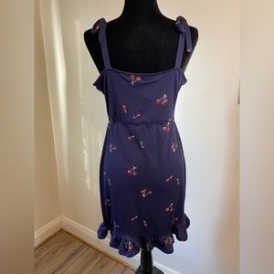Urban Outfitters dress navy cherry pattern. Has tie shoulders straps size Large.